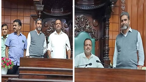 ಸಭಾಧ್ಯಕ್ಷರ ಪೀಠದ ಬಳಿ ಫೋಟೋ ತೆಗೆಸಿಕೊಳ್ಳುತ್ತಿರುವ ಕಾಂಗ್ರೆಸ್ ನಾಯಕರು.