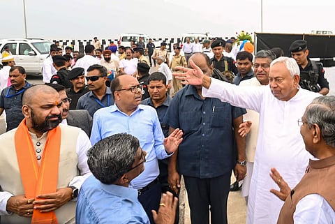 Bihar Chief Minister Nitish Kumar with Deputy Chief Minister Samarat Choudhry during the inauguration of the section of JP Ganga Pathway, in Patna, Wednesday
