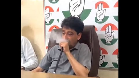 congress MP puffing away at party office