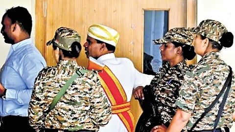 ED officials at the MUDA office in Mysuru on Friday.