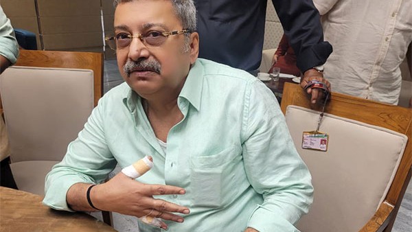 TMC MP smashes glass bottle