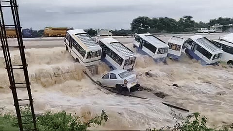 Buses Swept Away By Flood Waters