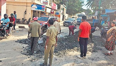 Panchayat members pay for road work