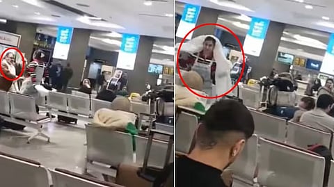 Iranian Woman Removes Cleric's Turban, Wears It As Hijab