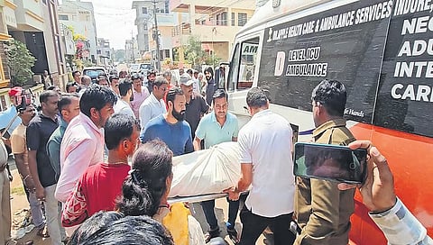 Locals carry bodies of the deceased in Belagavi on Sunday
