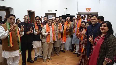 BJP president Virendra Sachdeva along with newly elected BJP MLAs at the party's Delhi office (Photo | Express)