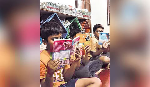 Children in Purple space library