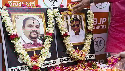 Tributes being paid to victims Manjunath Rao and Bharat Bhushan,