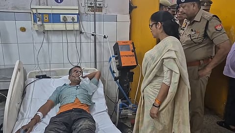 The District Magistrate of Bahraich, Monica Rani meeting the injured at the district hospital.