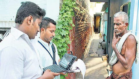 Officers gathering details during a previous census drive