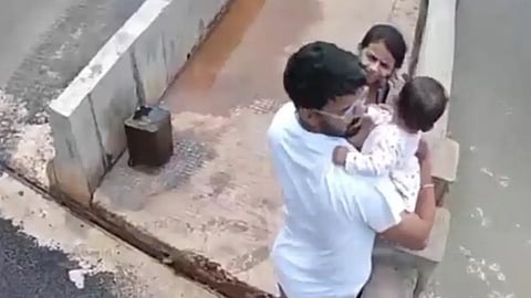 CTV grab of the couple with their baby on the Gangavali bridge near Gokarna