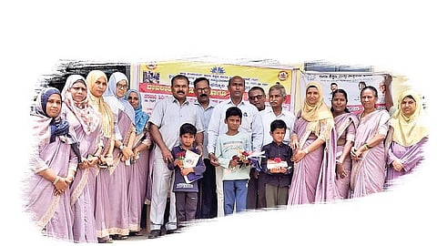 Officials and teachers with students who have rejoined school as part of the ‘Come, Come to School, for a Bright Future’ campaign in Gadag