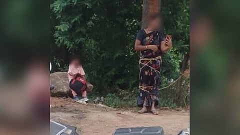 The woman was tied to a tree over a loan repayment dispute.