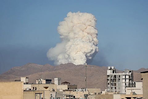 Smoke rises following an Israeli attack in Tehran, Iran on June 18, 2025.