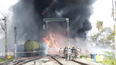 A fuel-laden railway tanker caught fire near Tiruvallur.Thick black smoke and intense flames engulfed the area, disrupting train services.
