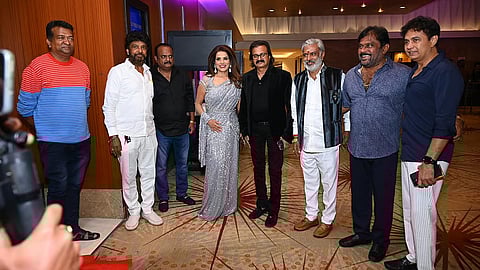 Vijay Tata (fifth from left)