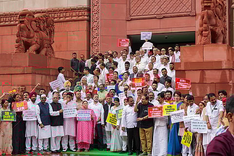 Opposition leaders protest outside parliament