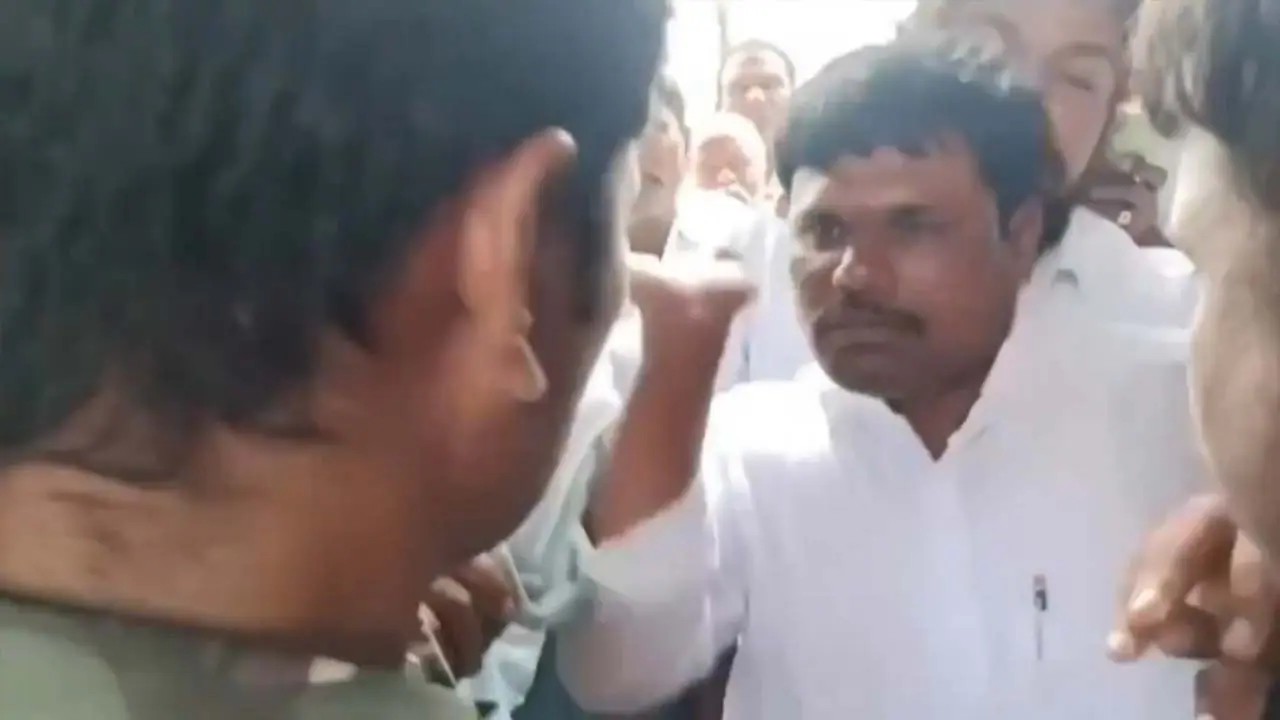 Andhra Pradesh Minister's Brother Slaps Cop At Temple