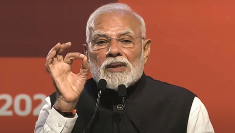 PM Narendra Modi addresses the gathering during an event to lay the foundation stone of development projects and the inauguration of the Yellow Line of Metro in Bengaluru