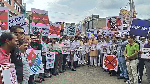 Jaipur traders staged a strong protest against United States President Donald Trump’s decision to impose steep additional tariffs on Indian goods.