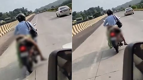 Husband carries wife body on motorcycle