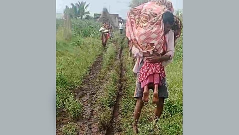 The mother and her newborn carried by their family to reach an ambulance 1.5 km away in Belagavi district