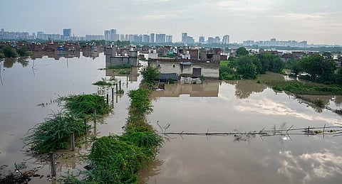 A flooded residential area after the Yamuna river water enters the Jaitpur Yamuna Pushta locality during the monsoon season