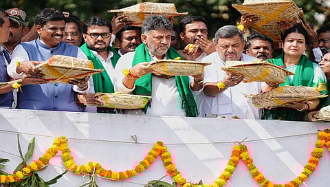 DK Shivakumar and other party leaders perform Ganga Puja at Bhadra Dam
