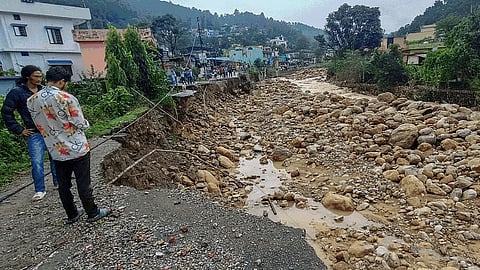 cloudburst triggered torrential rain and widespread destruction in Dehradun.