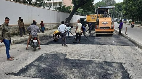 work of filling potholes in Bengaluru