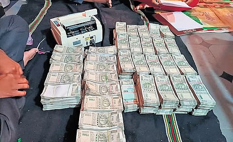 Rs 83.09 lakh in cash sezied from the residence of an official in Bidar.