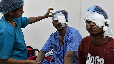 Patients injured while bursting crackers get treatment at Minto Eye Hospital in Bengaluru on Tuesday. Around 13 patients were treated by Tuesday afternoon.