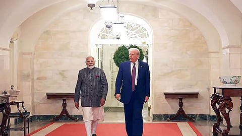 In this photo from February 14, 2025, Prime Minister Narendra Modi is seen walking along with US President Donald Trump at the White House, in Washington.