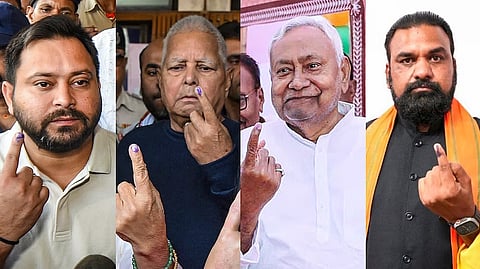 Opposition's CM face Tejashwi Yadav, RJD chief Lalu Prasad Yadav, Bihar Chief Minister Nitish Kumar and Deputy CM Samrat Choudhary show their ink-marked fingers