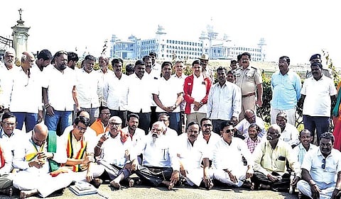 Activists stage a dharna in front of Suvarna Vidhana Soudha in Belagavi on Tuesday.