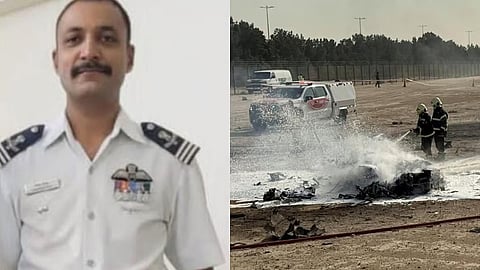 Wing Commander Naman Syal, 34 (L) Emergency services attend the scene after a HAL Tejas crashed during a demonstration at the Dubai Air Show