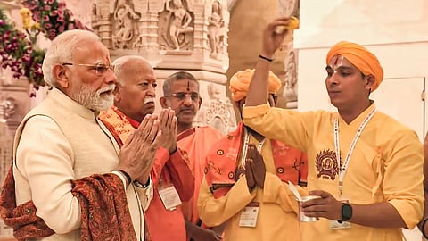 Prime Minister Narendra Modi with RSS chief Mohan Bhagwat offers prayers at the Ram Temple, in Ayodhya, Uttar Pradesh.