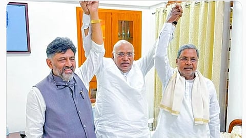 Mallikarjun Kharge along with DK Shivakumar and Siddaramaiah.