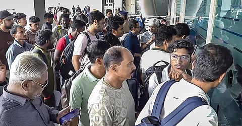 Passengers at an IndiGo airline's counter at the airport, in Chennai, Tamil Nadu, Saturday