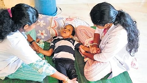 Nurses attend to a victim of endosulfan