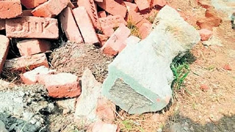 The damaged remains of the pillar near the underground Shiva Temple