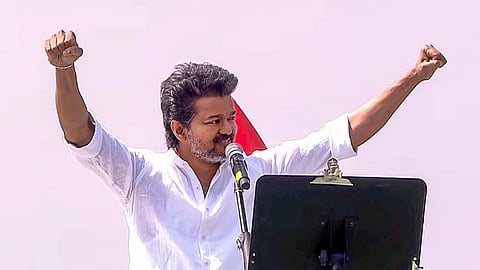 Tamilaga Vettri Kazhagam (TVK) chief Vijay speaks during a public meeting, in Erode, Tamil Nadu.