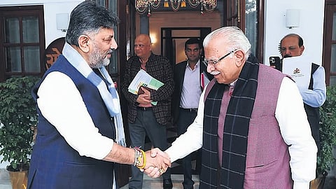 Deputy CM DK Shivakumar greets Union Housing and Urban Affairs Minister Manohar Lal Khattar in New Delhi on Tuesday.