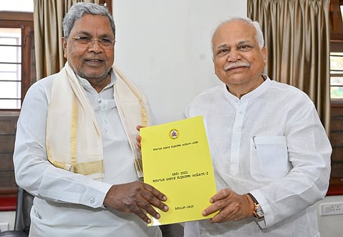 Chairman of the Karnataka Administrative Commission-2 R V Deshpande submits the commission's 10th report to Chief Minister Siddaramaiah