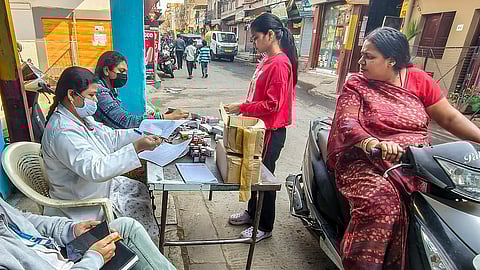 Medicines being distributed at a camp after several people were affected due to consumption of contaminated water at Bhagirathpura area, in Indore, Madhya Pradesh