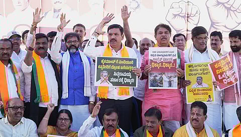 BJP stages protest against giving houses to those who lost their dwellings in eviction in Kogilu