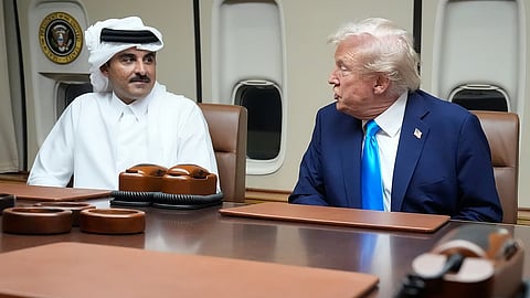 Donald Trump, right, meets with Emir of Qatar Sheikh Tamim bin Hamad