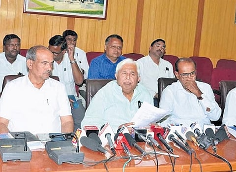 Minister HK Patil at the press conference in Gadag