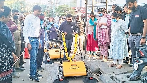 North City Corporation Commissioner Pommala Sunil Kumar operates a mechanical sweeper on Thursday.
