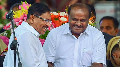 Parameshwar and H.D. Kumaraswamy (File photo)